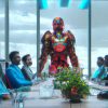 DALL·E 2022-10-18 15.35.28 - 8k photo a business conference room filled with executives wearing superhero outfits and robots, 8k ultra realistic, 4k, hyper realistic, extreme deta